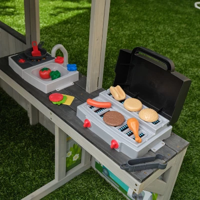 KidKraft Patio Party Wooden Outdoor Playhouse With Spinner Block Puzzle - 14pc 9 KidKraft Patio Party Wooden Outdoor Playhouse With Spinner Block Puzzle - 14pc - Image 7